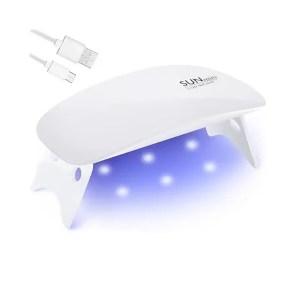 Mini Lampe UV LED Sunmini portable pour vernis semi-permanent, format voyage pliable, matériel onglerie professionnel Cosminty Réunion.