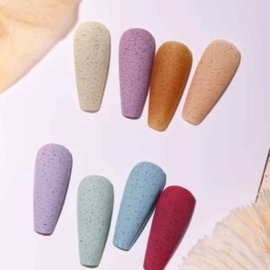 Ongles décorés avec top coat sugar pour une finition granulée