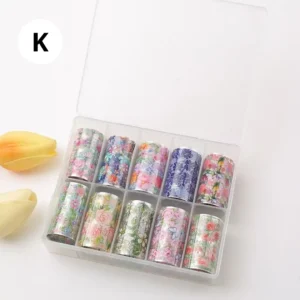 Coffret de papiers foils professionnels pour transfert sur ongles, diverses couleurs et effets miroirs, disponible chez Cosminty Réunion.
