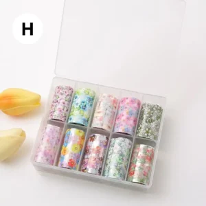 Coffret de papiers foils professionnels pour transfert sur ongles, diverses couleurs et effets miroirs, disponible chez Cosminty Réunion.