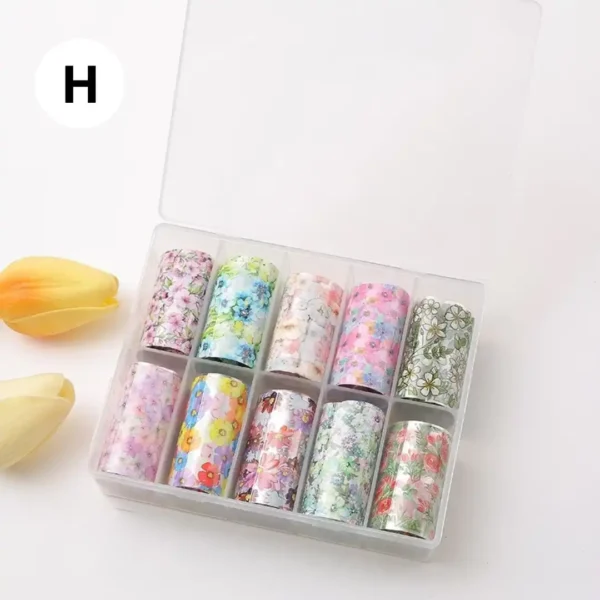 Coffret de papiers foils professionnels pour transfert sur ongles, diverses couleurs et effets miroirs, disponible chez Cosminty Réunion.
