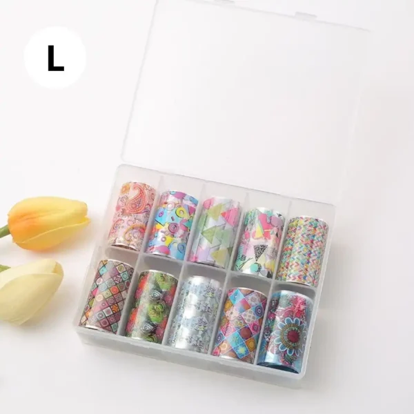 Coffret de papiers foils professionnels pour transfert sur ongles, diverses couleurs et effets miroirs, disponible chez Cosminty Réunion.