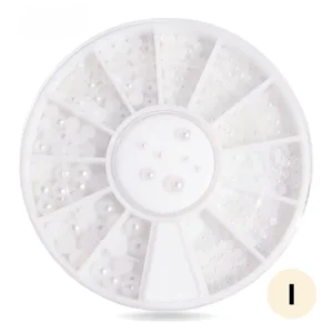 Roue de strass colorés pour ongles, 12 compartiments de cristaux brillants pour manucure créative.