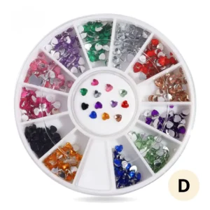 Roue de strass colorés pour ongles, 12 compartiments de cristaux brillants pour manucure créative.