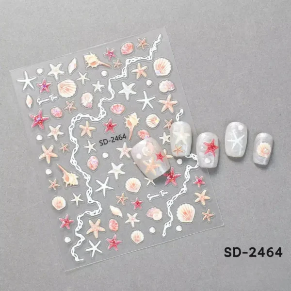 Planche de stickers autocollants 5D relief thème mer coquillages nacrés et étoiles de mer rose corail SD-2464 avec exemples sur capsules blanches nacrées, Cosminty matériel onglerie La Réunion 974.